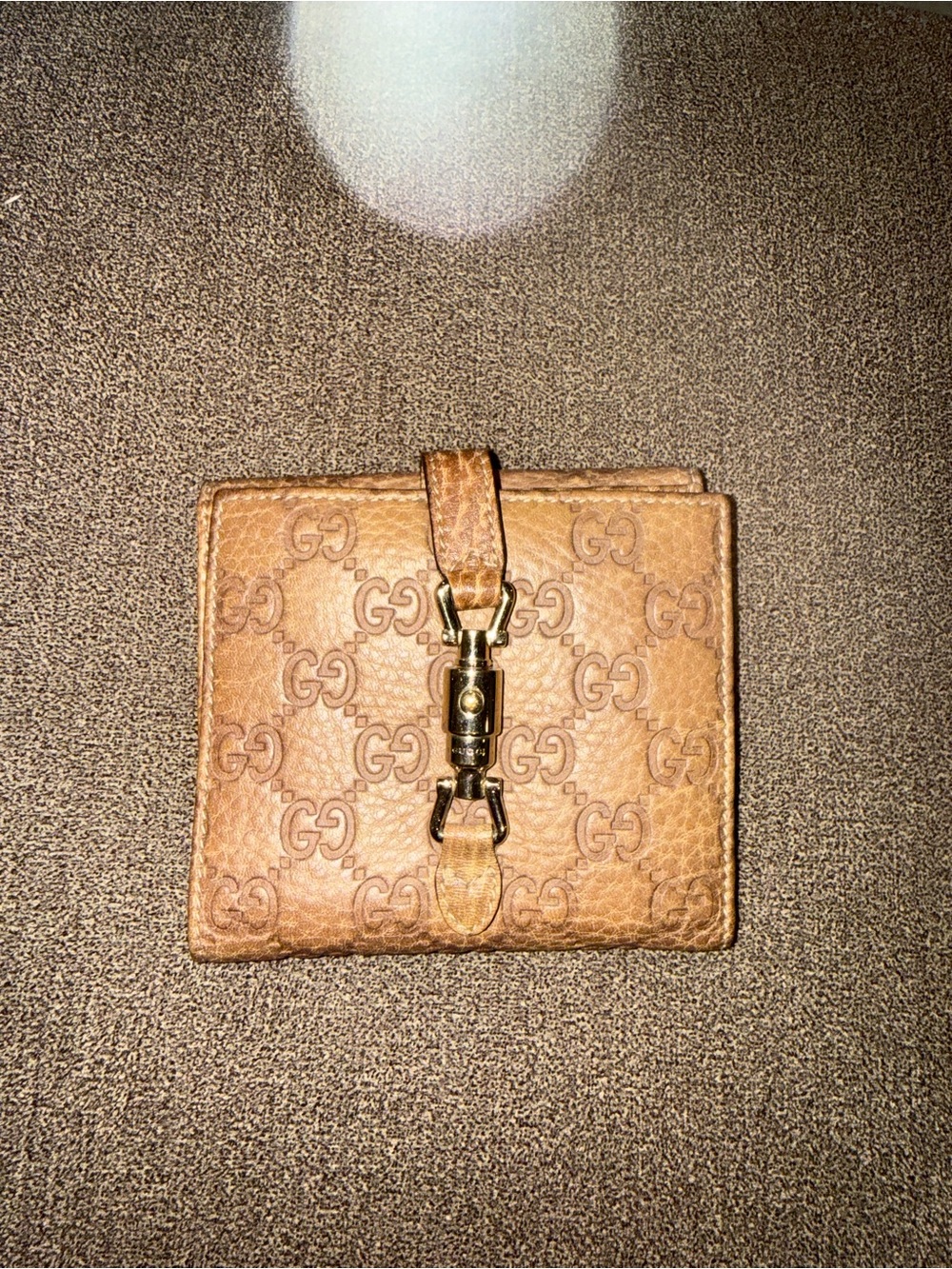 Gucci Jackie Monogram Leather Trifold
Wallet